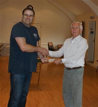 Paul presents a cheque for �150 raised for Sittingbourne MS to Smith Adams